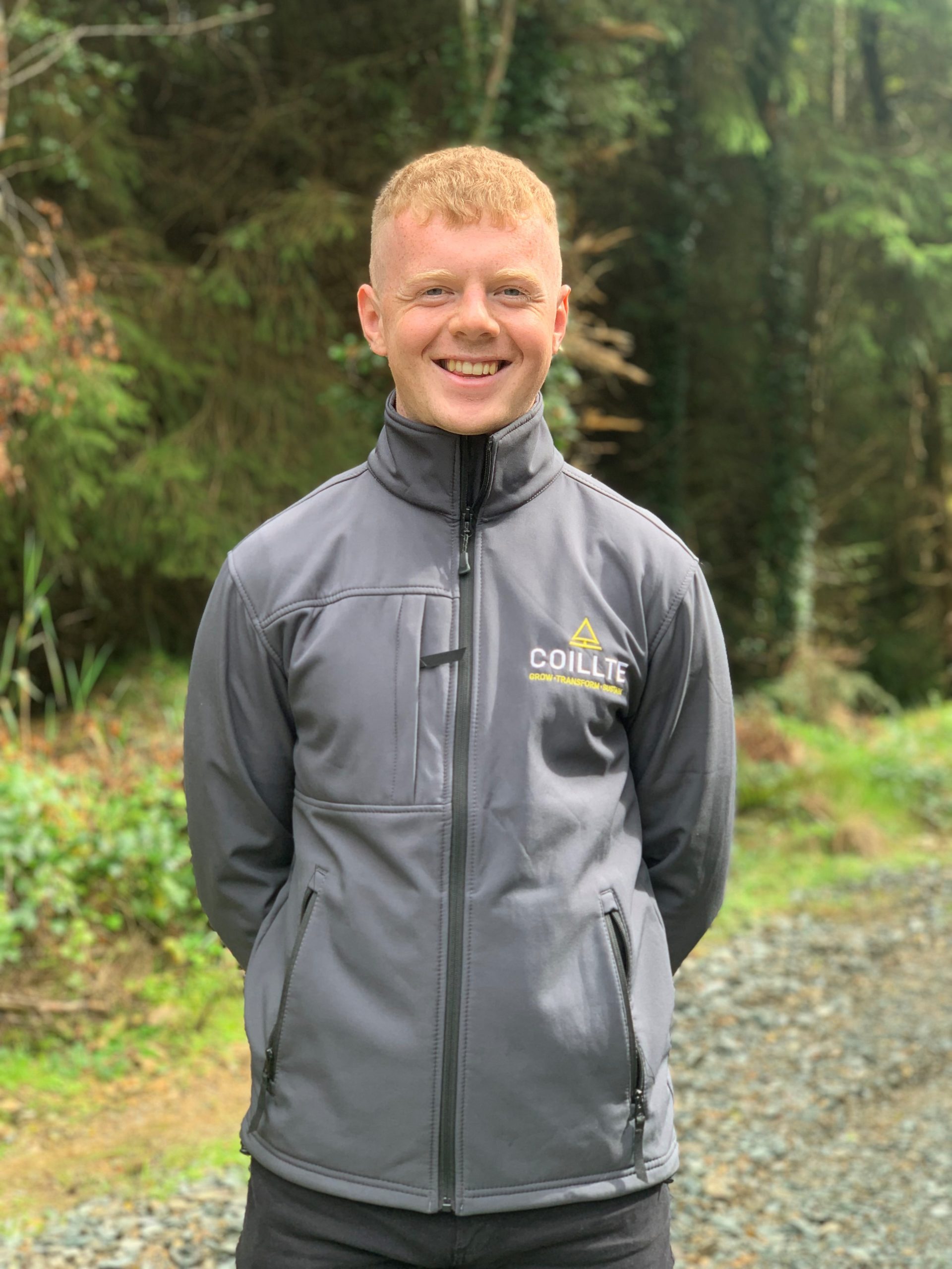 Mark Murphy graduate 2022 Picture of Coillte graduate Mark Murphy standing in the forest.