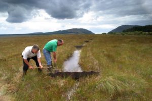 Picture of men blocking drains on Coillte blanket bog habitat