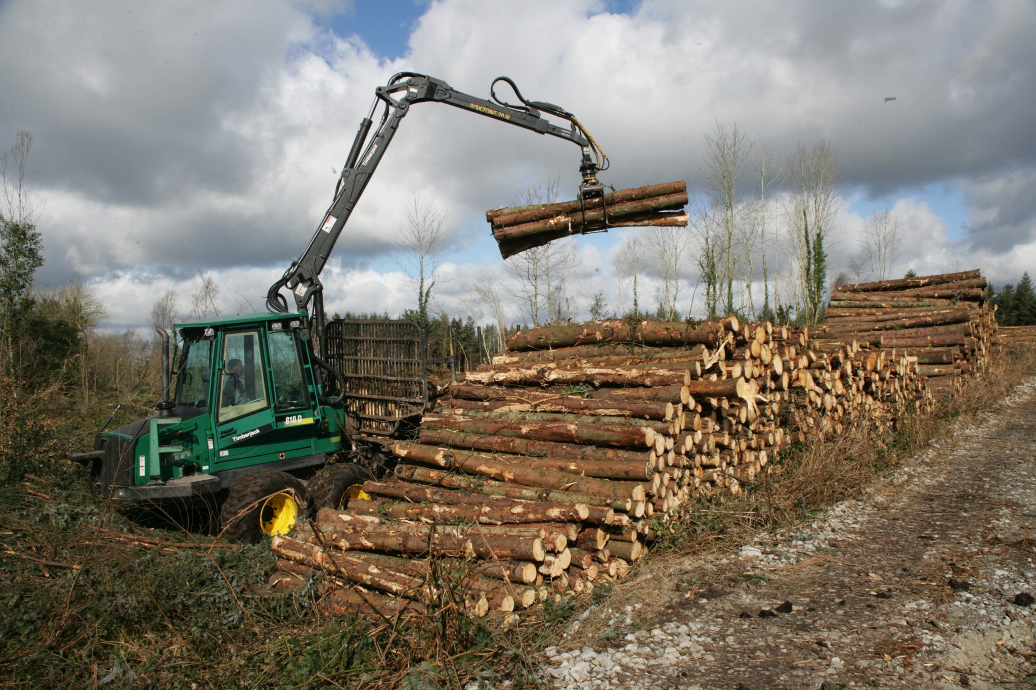 Machine stacking Coillte timber in County Laois