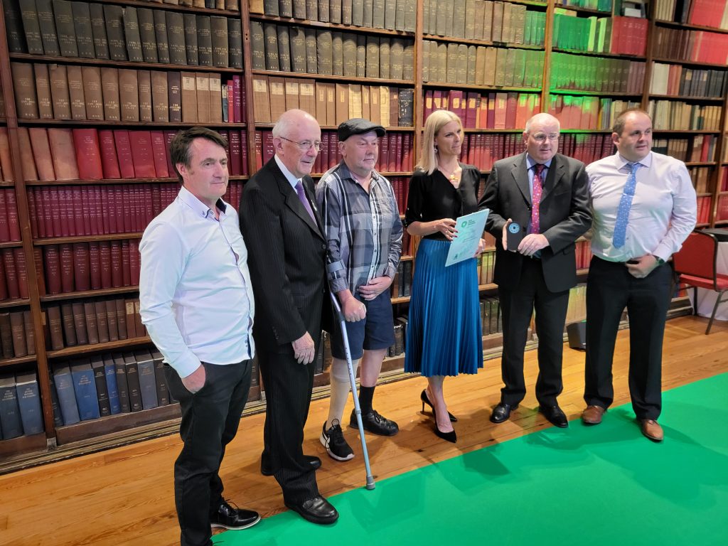 Coillte management team along with Mr Dick Bourke of the Knockranny Residents Association accepting an award from the Minister of State fo Landuse and Biodiversity