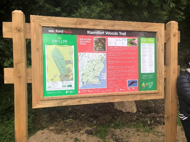 Picture of wooden trail head recreational aign for Ramsfort forest showing maps of walks and information on the forest